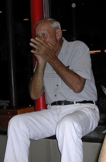 Fred playing harmonica